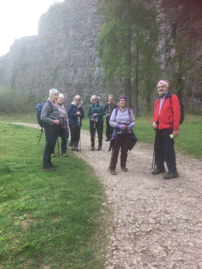 Seven of our group pausing at the foot of the towering quarry face.
Mair was the eigth member who took the photo.