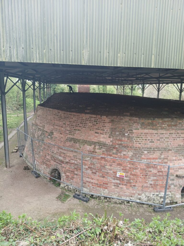  View of the lime kiln showing protective roof cover.